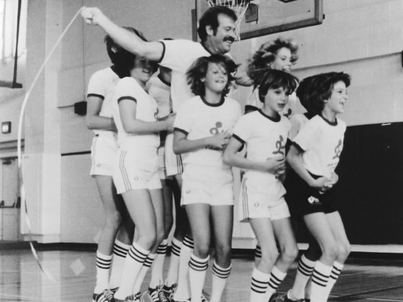 With their coach, physical education teacher Richard Cendali (center), the Skip-Its were the 1981 national demonstration team for Jump Rope For Heart, a school-based challenge that preceded today's Kids Heart Challenge and American Heart Challenge. The jump-rope squad was from Boulder Valley, Colorado, schools. (American Heart Association archives)