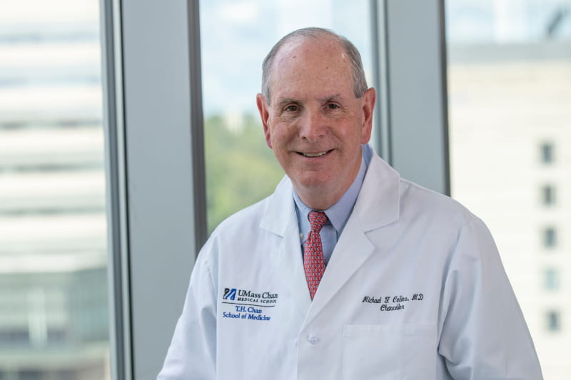 Michael Collins, M.D., took Harrington under his wing after his mother died, motivating him to stay the course. They remain close today. Collins is now chancellor at UMass Chan Medical School. (Photo courtesy of UMass Chan Medical School)