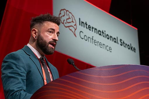 A speaker talking at the podium at the International Stroke Conference