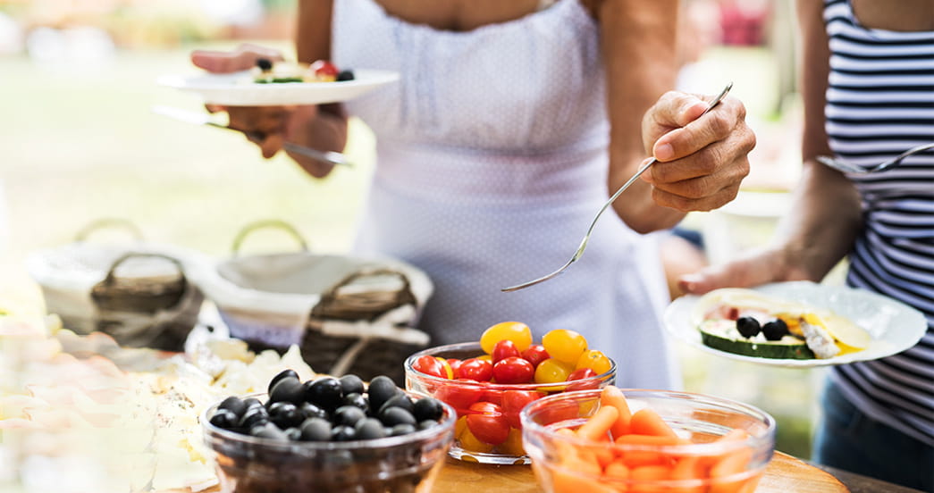 https://www.heart.org/-/media/AHA/Recipe/Article-Images/Woman-serving-vegetables-fruit.jpg