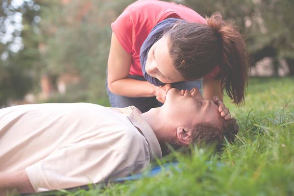 female bystander listening for breaths female bystander listening for breaths