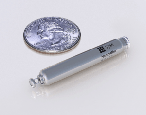 Nanostim pacemaker next to a United States quarter