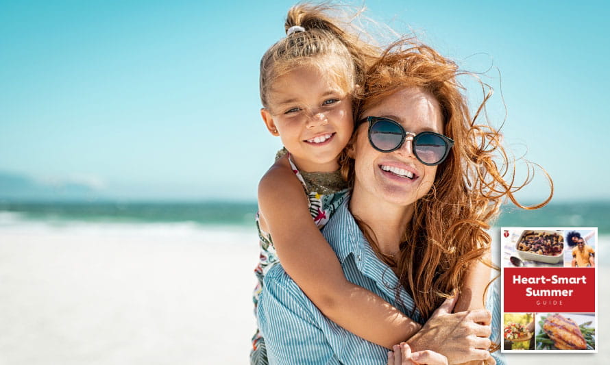 mom gives daughter piggyback on beach mom gives daughter piggyback on beach