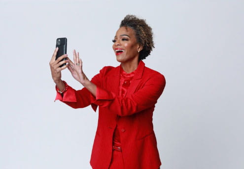 Real Woman Class of 2022 Erica uses cell phone Real Woman Class of 2022 Erica uses cell phone