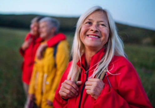 smiling backpacking woman smiling backpacking woman