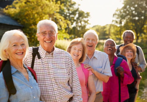 group of happy seniors smile for portrait group of happy seniors smile for portrait