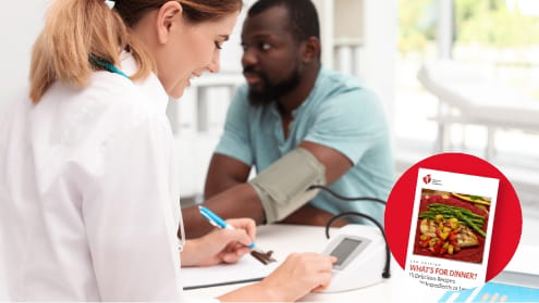 man gets blood pressure taken man gets blood pressure taken