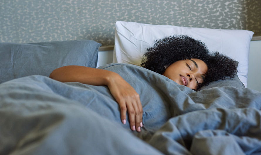 https://www.heart.org/-/media/Healthy-Living-Images/Healthy-Lifestyle/Sleep/woman_sleeping_in_her_bed_at_home.jpg?h=530&iar=0&mw=960&w=890&sc_lang=en