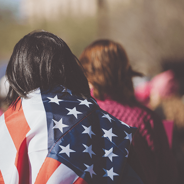 person wrapped in american flag