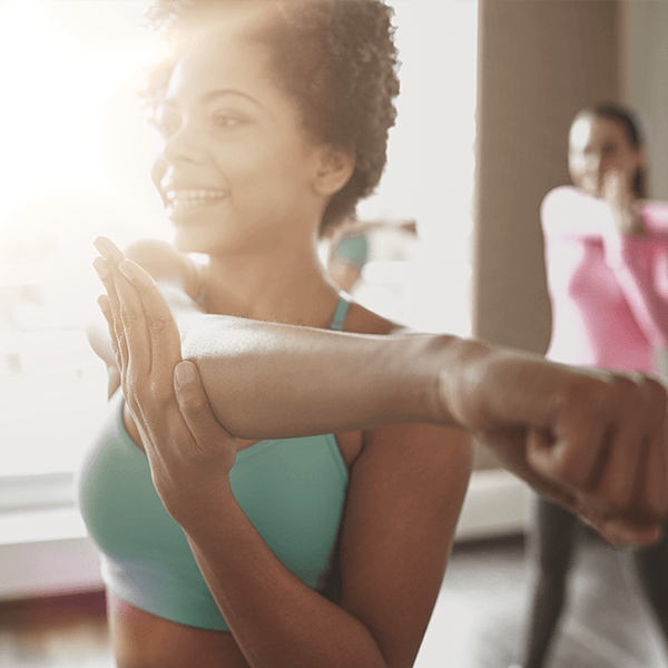 woman stretching arms