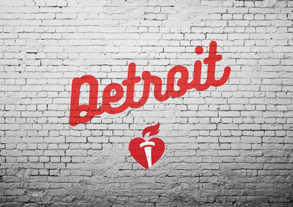 brick wall graphic with Detroit written on it and AHA heart and torch logo