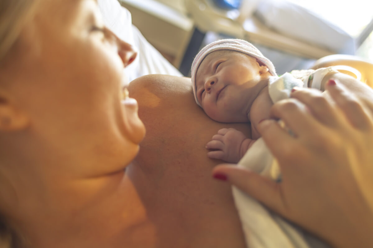 mom holding her newborn baby