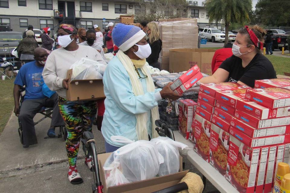 people shopping at outdoor market
