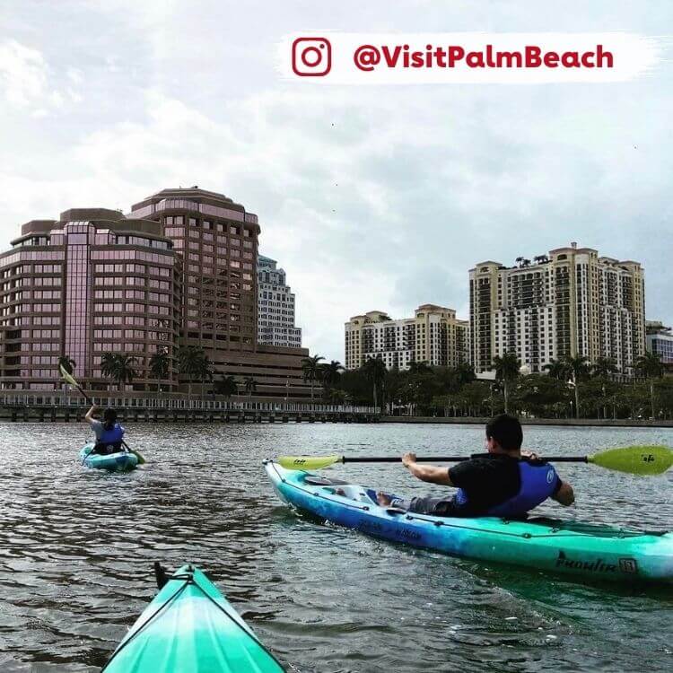 people kayaking in a lake