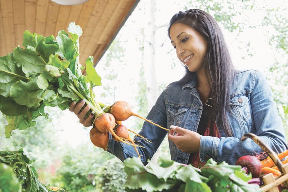 woman choosing veggies