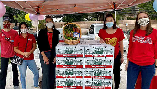 AHA staff volunteering at food bank