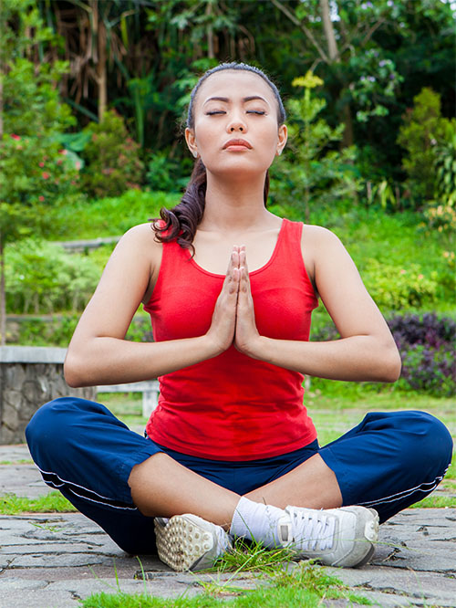 woman in red meditating