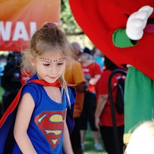 Little girl in red cape