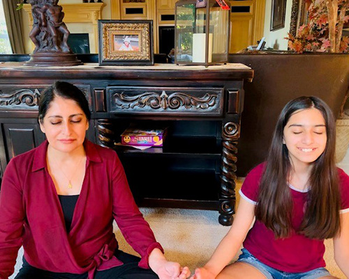 Dr. Reetu Sharma and her daughter Avantika Raina meditating