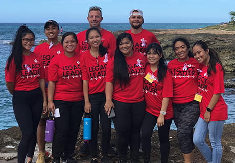 group of students by the ocean
