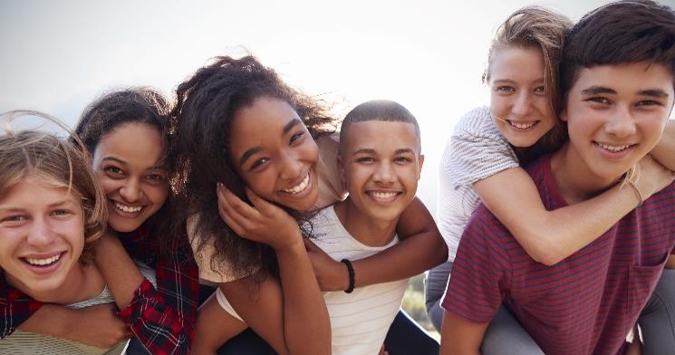 Group of smiling teens