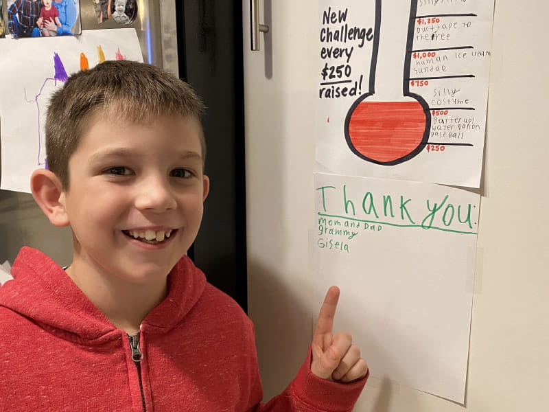 Mason McElhinney, shown tracking his goal in the 2022 Kids Heart Challenge, says it warms his heart to know his efforts can help children who have heart disease. (Photo courtesy of Casey McElhinney)