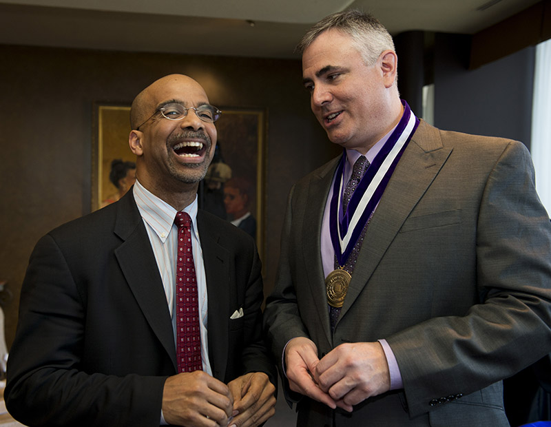 Donald Lloyd-Jones with Dr. Clyde Yancy, a past AHA president, after Lloyd-Jones was invested as the Eileen M. Foell Professor of Heart Research at Northwestern University Feinberg School of Medicine in 2013. The two are best friends. (Courtesy of Donald Lloyd-Jones)