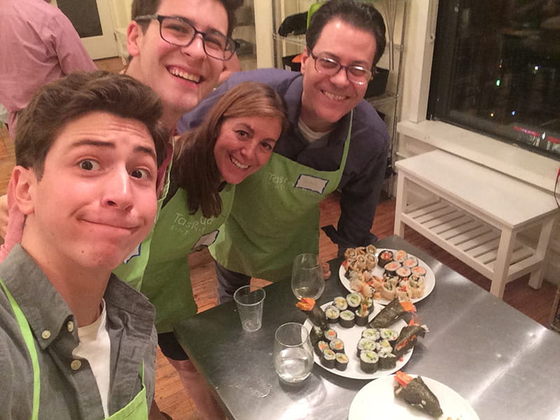 The Elkind family cooking together, from left: Liam, Zachary, Rachel and Mitch Elkind.