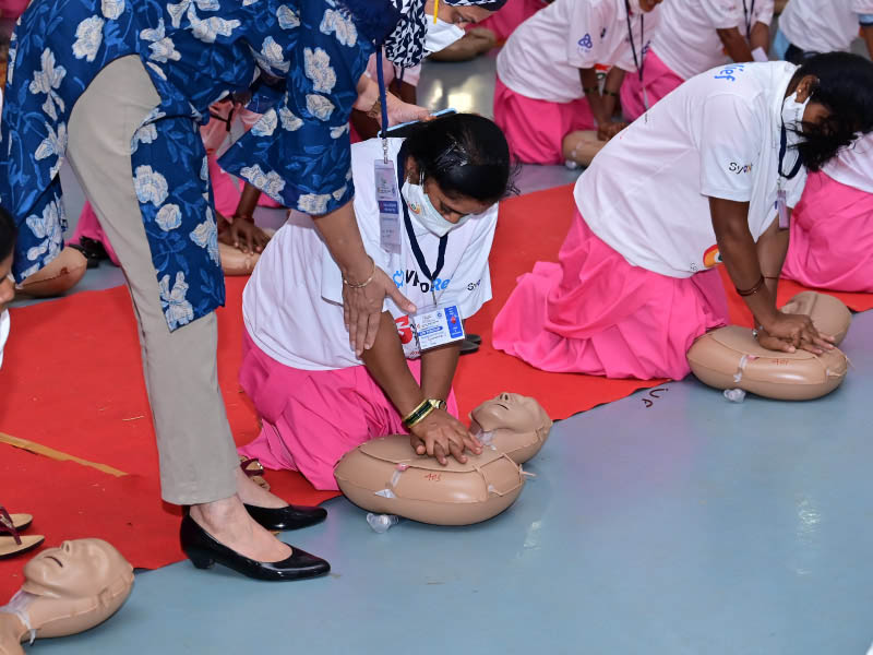 Participants in Chitradurga, Karnataka, India, practice CPR skills on manikins at a September training event. (Photo by ICATT Foundation)