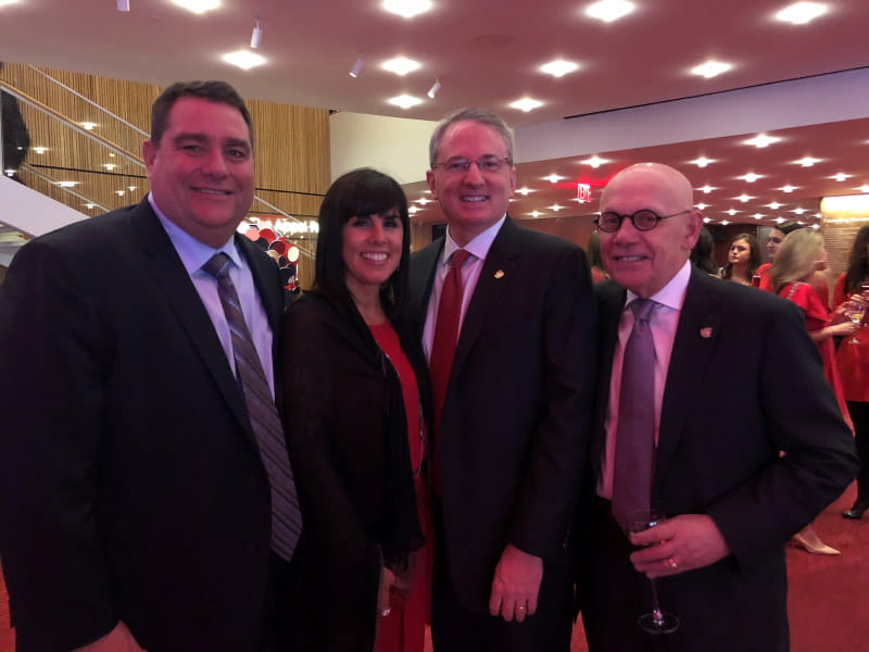 Jim Postl (right) served as board chair while Dr. John Warner (second from right) was AHA president. The AHA’s 2021-23 board chair, Ray Vara, is at left, shown alongside his wife, Tiffany Vara