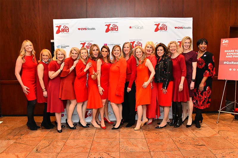 Liz Elting (pictured near center) at the 2019 Go Red for Women Luncheon in New York City. “Thanks to the Go Red movement, we’re making progress in awareness and health equity when it comes to fighting heart disease,” she says. (Photo courtesy of Liz Elting)