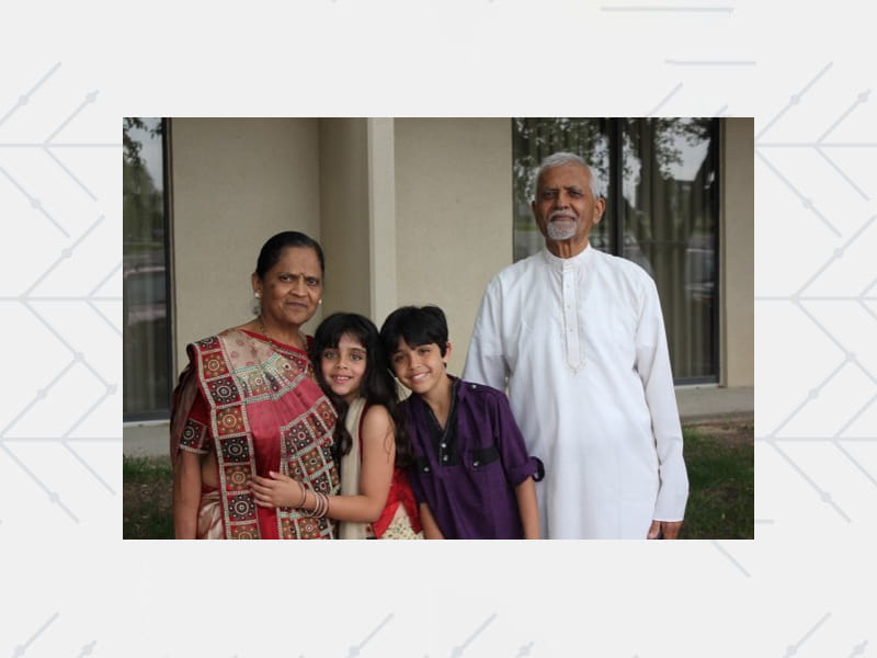 Dr. Manesh Patel’s parents, Indu (left) and Raman with their grandchildren