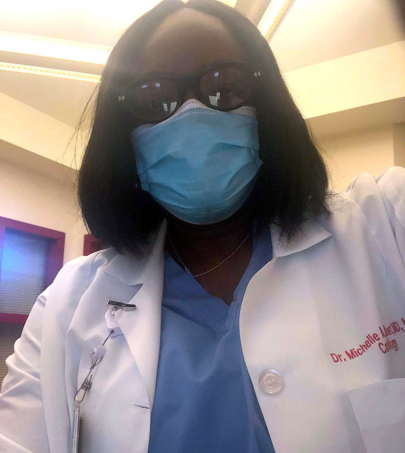 Despite numerous commitments, Dr. Albert continues to see critically ill patients, many of whom may not otherwise see a heart doctor who looks like them and can relate to them. (Photo courtesy of Michelle Albert)