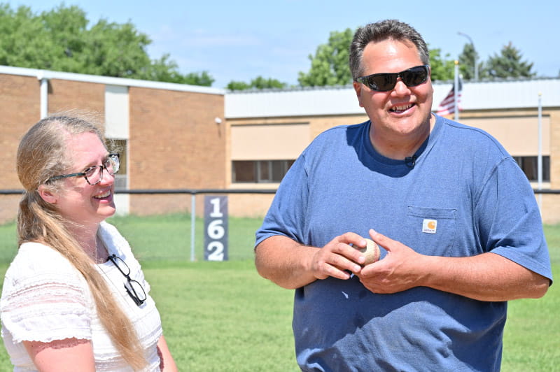 Amy and Jerry Noeske visit the baseball field dedicated to their son, Sam. 