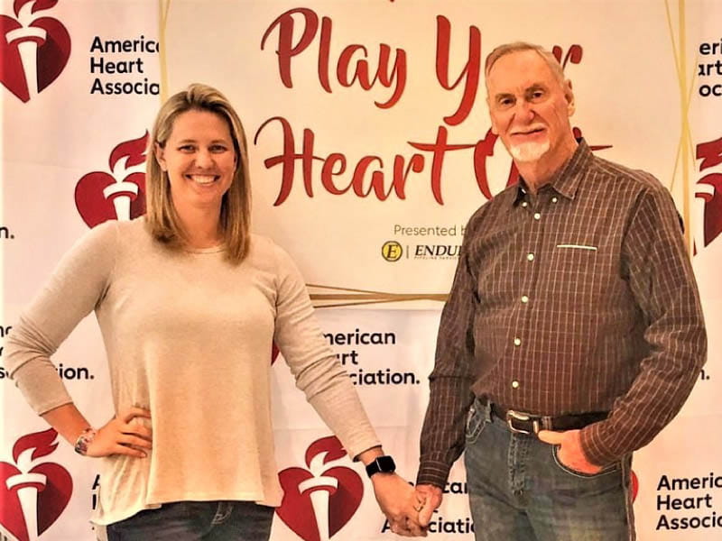Robin Riley and Dwayne Laymon's efforts to improve heart health include the Play Your Heart Out initiative, which Laymon's company sponsored in 2019 to help Tulsa-area kids get more active and to collect donations of sports and recess equipment. (Photo courtesy of Anna Riley)