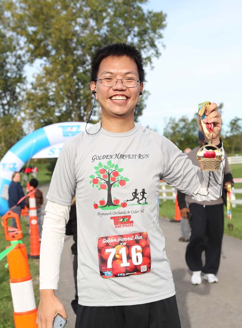 Just a few days after undergoing a septal myectomy to treat his hypertrophic cardiomyopathy, Vi Tang knew his condition had improved. These days he’s biking and running races. (Photo courtesy of Vi Tang)