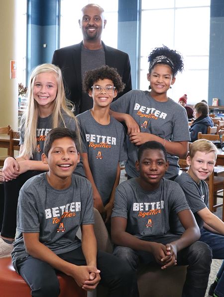 Yonas Michael with some of his Ames Middle School students.