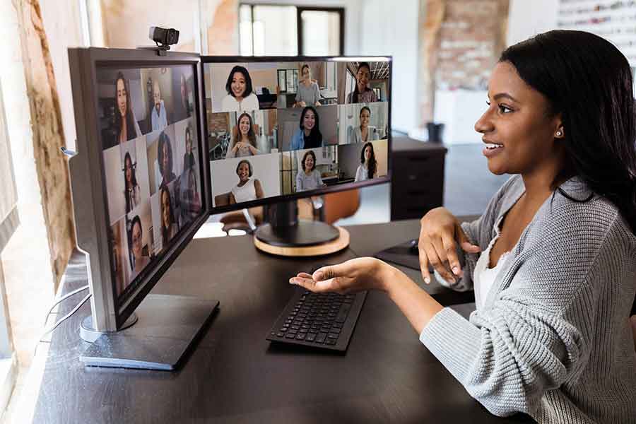 woman on video teleconference for work from home office