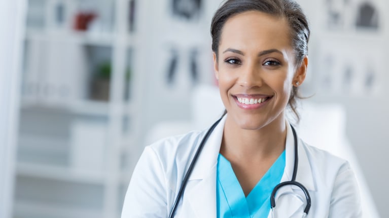 Female doctor looking at camera