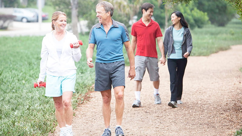 adult friends walking outdoors