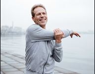 man stretching on a jog