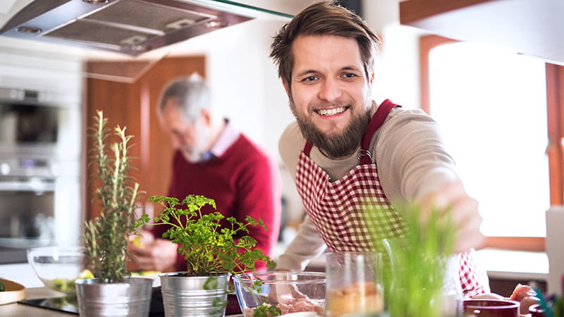 https://www.heart.org/-/media/Images/Health-Topics/High-Blood-Pressure/hipster-son-and-dad-cooking.jpg