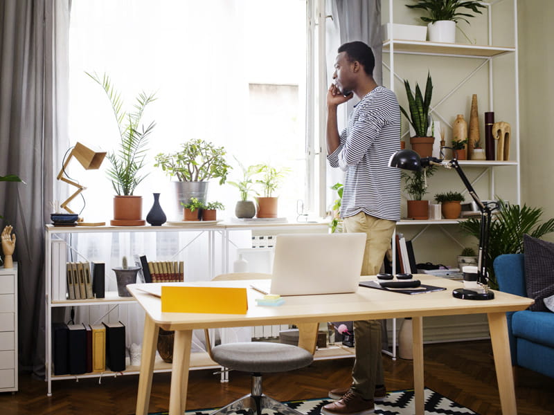 man working from home on phone