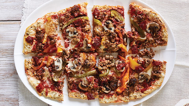 Cauliflower Crust Pizza with Vegetable Topping and Balsamic Glaze
