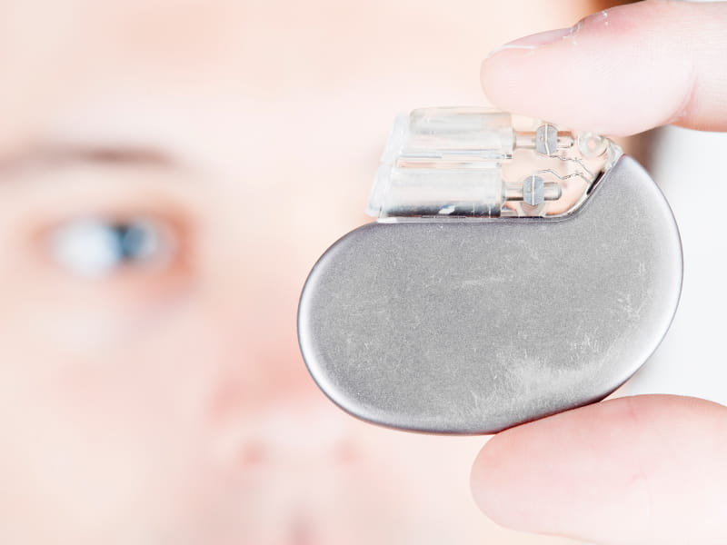 Man holding pacemaker.