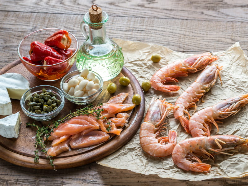 Foods and olive oil, part of the Mediterranean diet. (Alex9500/Envato Elements)