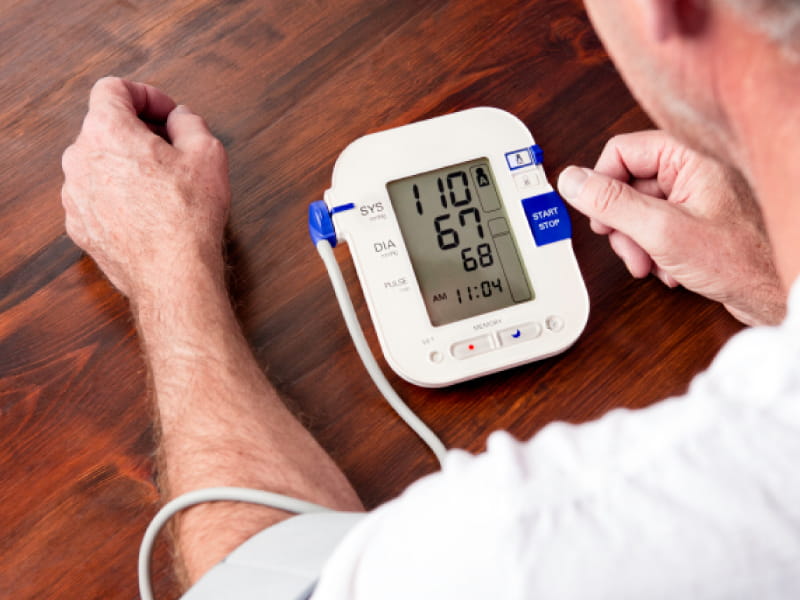 Man taking blood pressure. 