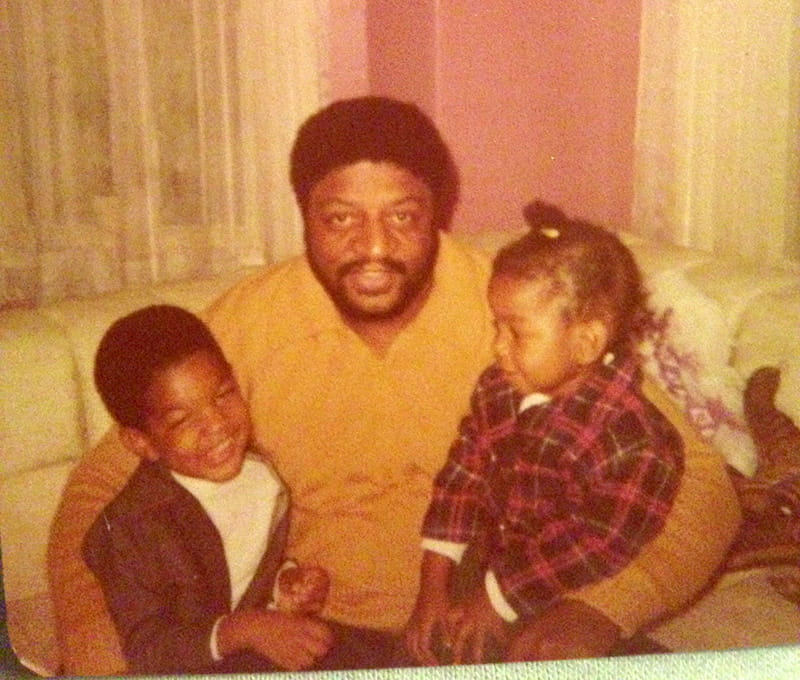 Cherie Craft as a young child sits with her father, Bill Craft. (Photo courtesy of Cherie Craft)