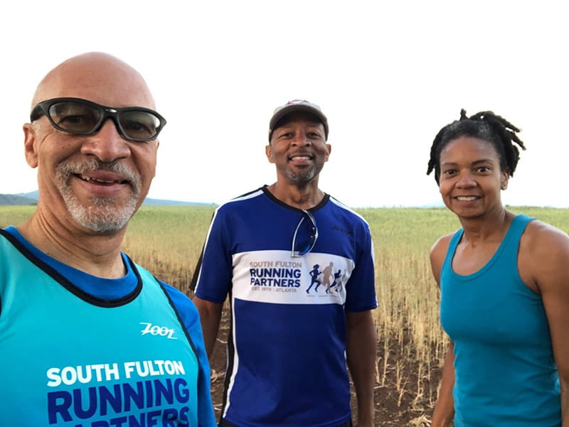 From left: Ralph Lyons, Jason James and Lori Palmer of Atlanta's South Fulton Running Partners running a virtual race in Tanzania in July 2021. (Photo courtesy of South Fulton Running Partners)