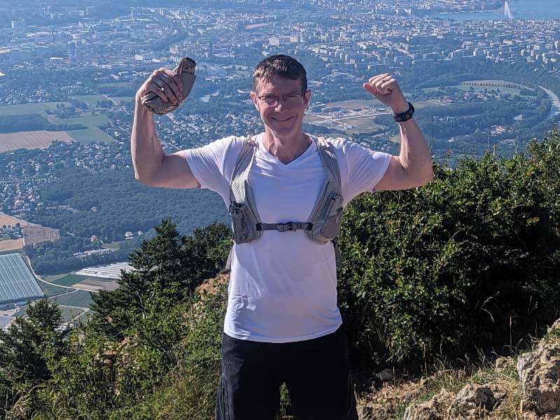 Psychology professor Dr. Philip Gable after climbing a mountain in the Alps overlooking Geneva. (Photo courtesy of Philip Gable)